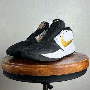 SOLD Nike Team Hustle D 9 Youth Basketball Black White and Gold Sneakers